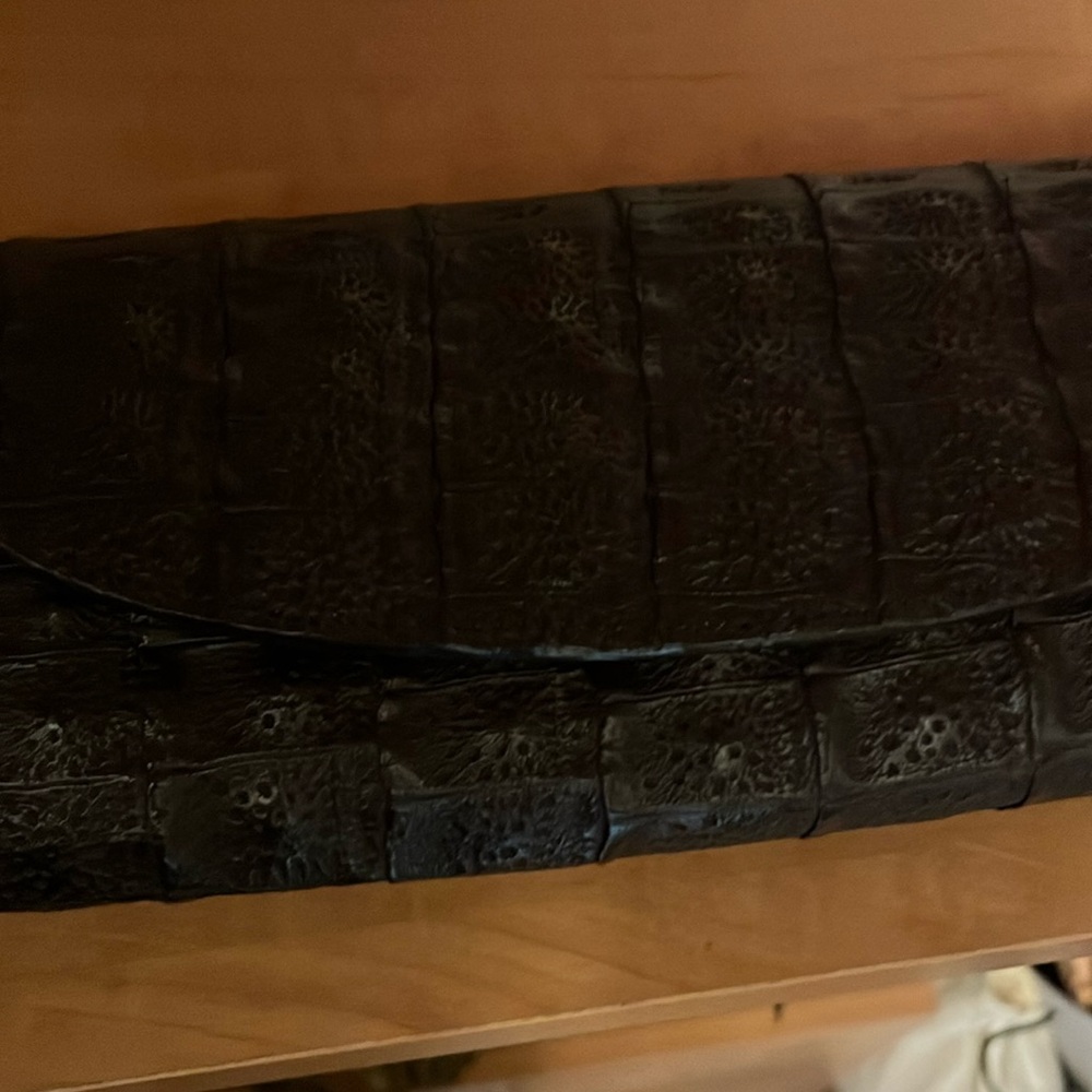 Crocodile skin black bag, like new. Zipper inside, silver chain